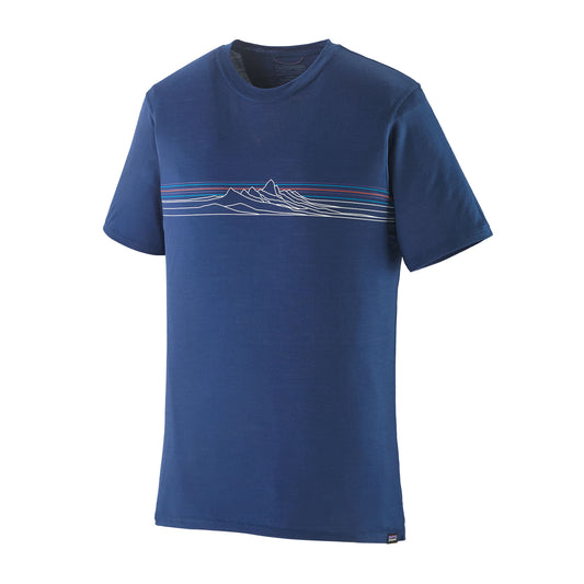 Camiseta técnica de lana merino Patagonia M's Cap Cool Merino Blend Graphic Shirt en color azul, con gráfico en el pecho, diseñada para regular la temperatura, controlar olores y ofrecer comodidad en actividades al aire libre, fabricada con lana RWS y poliéster reciclado.